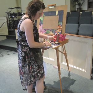 Kathering Horst collaging live for a wedding ceremony